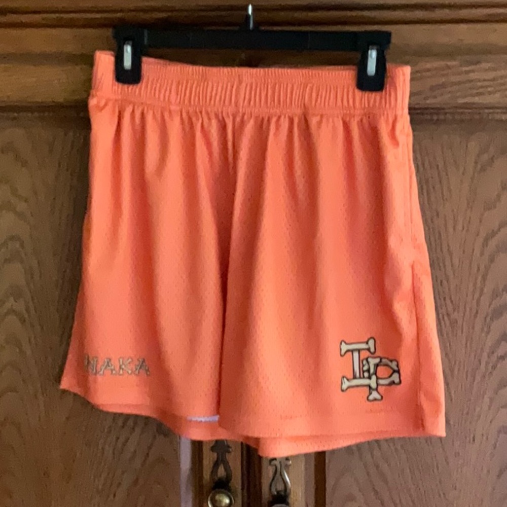 Inaka Power Orange Athletic Shorts with Lightweight Fabric and Elastic Waistband